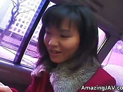 Hot asian babe in car having fun